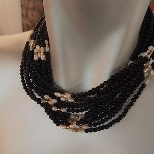 Necklace with pearls and contrasting beads
